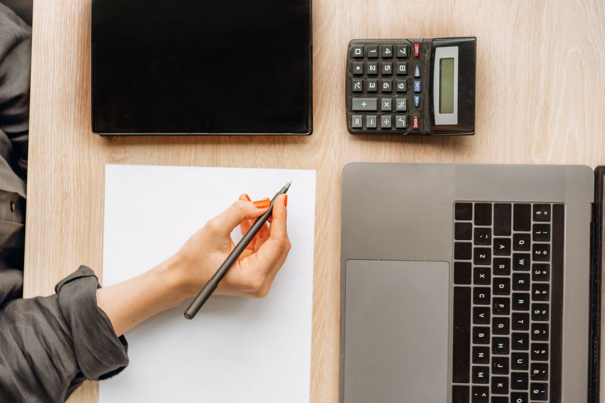 Featured image for Freelance Rate Calculator Guide 2026: How Much to Charge Hourly vs Project